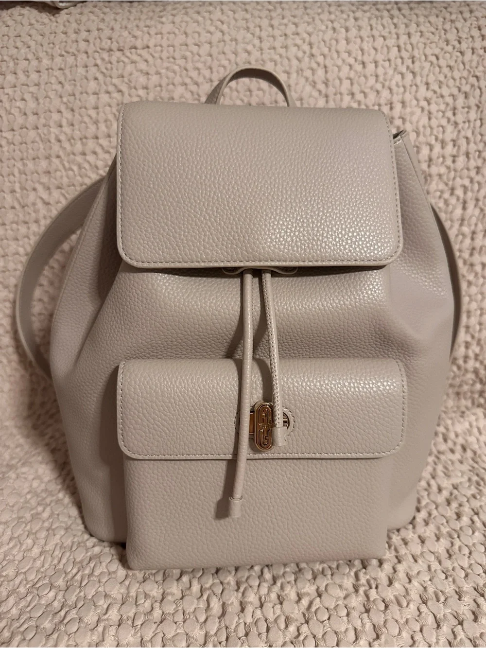 Furla Pebbled Leather Drawstring Backpack - Light Cream